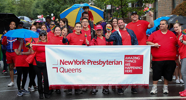 a group of people holding a banner