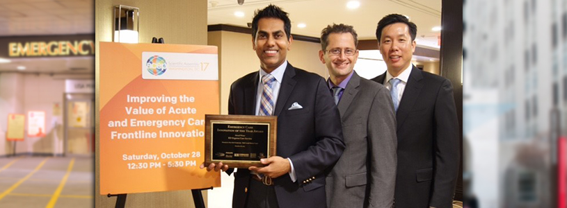 a group of men holding a plaque