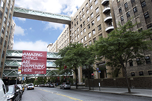 Columbia with a banner that says Amazing things are happening here