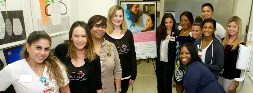 a group of people posing for a photo