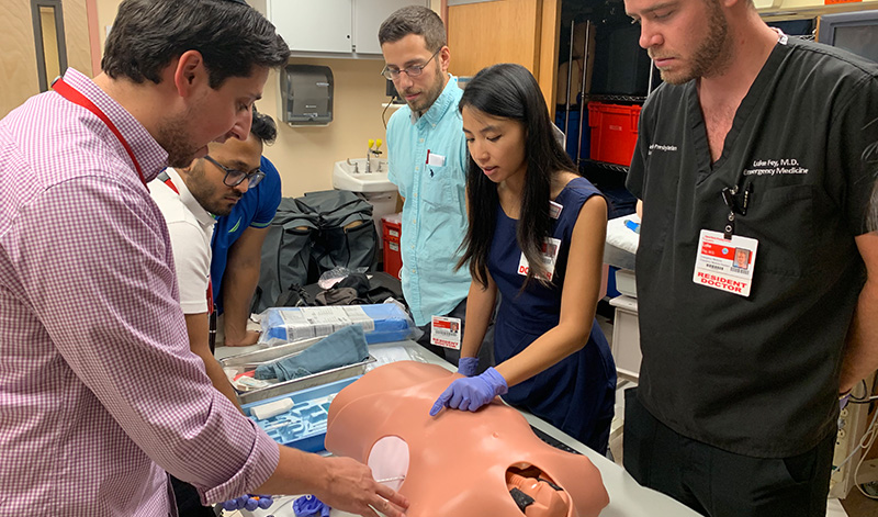 NewYork-Presbyterian Queens emergency medicinedoctors demonstrate how to insert a chest tub in the simulations lab.