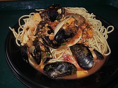 photo of cioppino over pasta