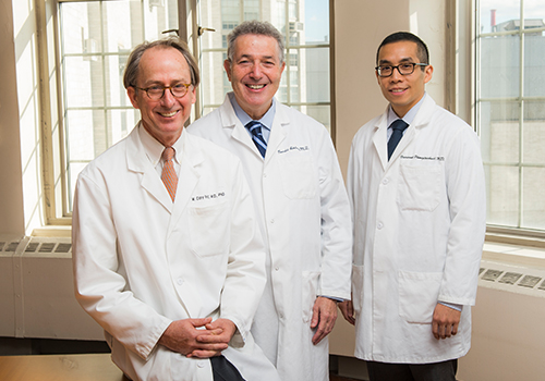 Photo of Dr. M. Cary Reid, Dr. Ronald D. Adelman, Dr. Veerawat Phongtankuel,