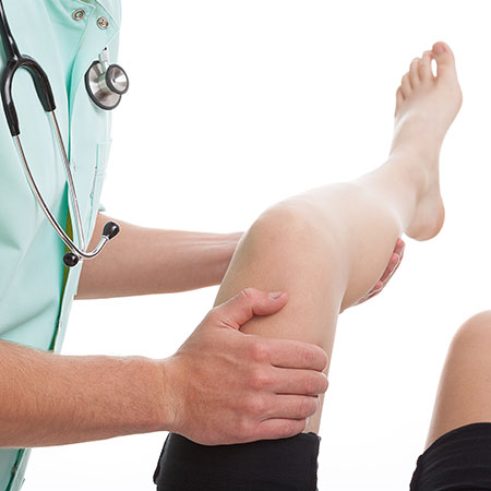 physician checking the knee