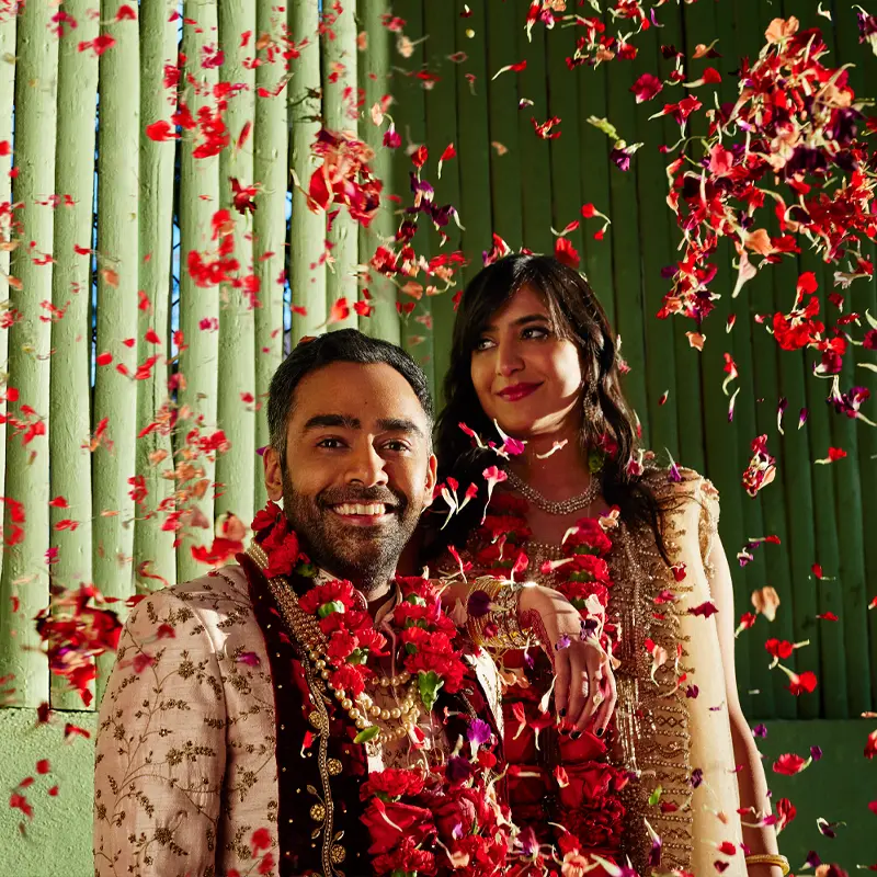 Male and female standing next to each other during celebration