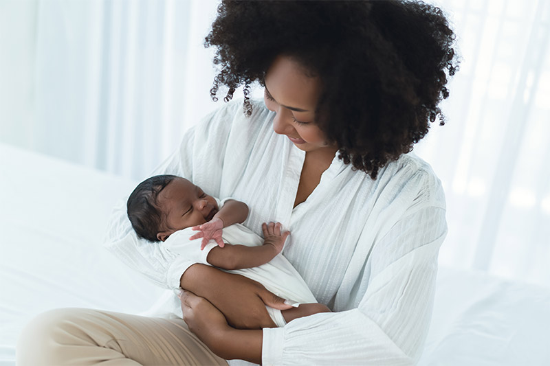 Woman holding newborn