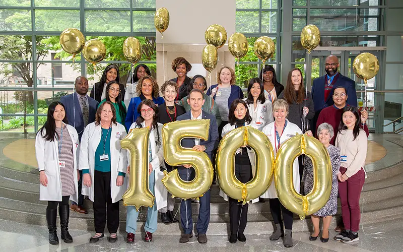 transplant team with balloons celebrating group photo