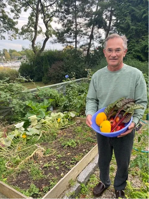 Dr. Chabot with a haul from his garden. 