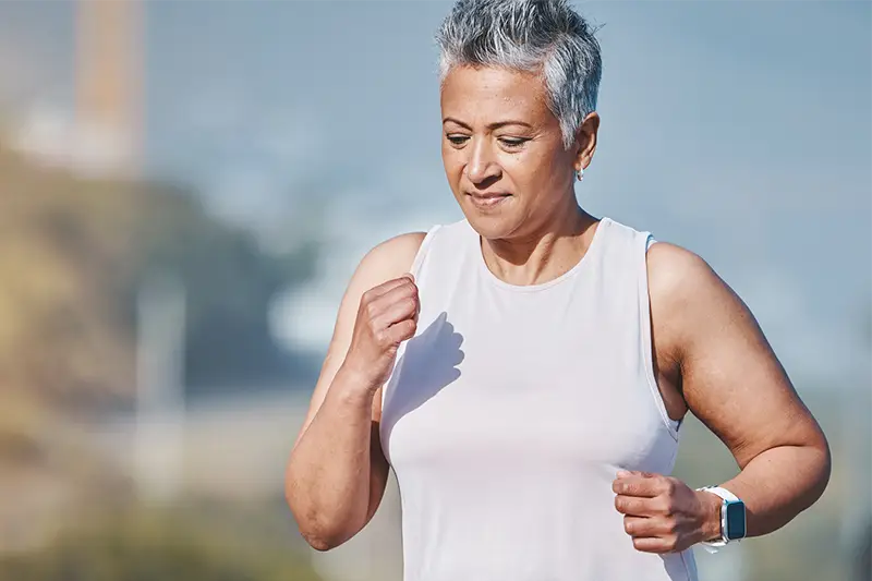 image of woman jogging